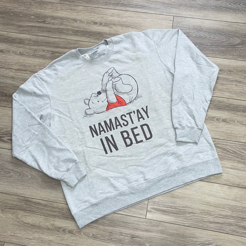 Unisex Disney Winnie the Pooh crewneck sweatshirt.